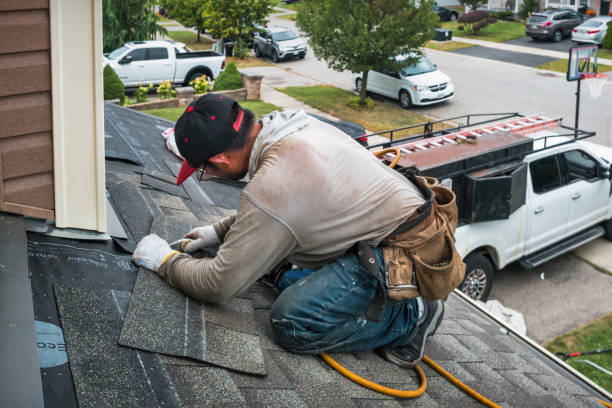Professional Roofing technician working in Howard, WI